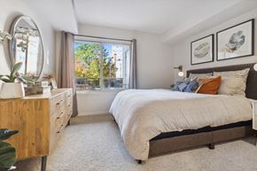 Stamford apartment for rent - a bedroom with a bed and a window