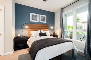South San Francisco apartment for rent - a bedroom with a bed and a large window