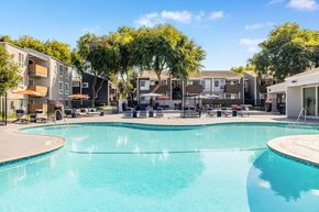 Fremont apartment for rent - A swimming pool in a sunny outdoor setting.