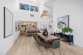 Fremont apartment for rent - A modern dining room with a wooden table and chairs.
