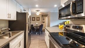 Simi Valley apartment for rent - a kitchen with a stove and a microwave