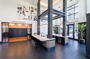 South San Francisco apartment for rent - a dining area with a table and chairs in a large room with large windows