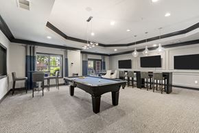 Johns Creek apartment for rent - play a game of pool in our game room at our apartments