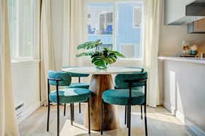 Everett apartment for rent - a small dining room with a table and three chairs