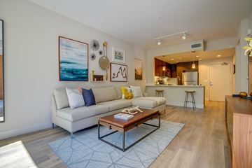 San Jose apartment for rent - a living room with a couch and a coffee table