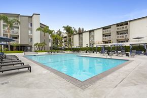 Los Angeles apartment for rent - A large swimming pool in front of apartment buildings.