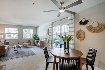 Sunnyvale apartment for rent - A living room with a dining table and chairs.