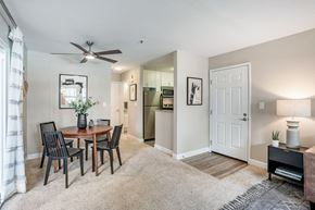 Sunnyvale apartment for rent - A dining room with a table set for four.