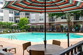 Stamford apartment for rent - our apartments have a swimming pool and a patio with an umbrella