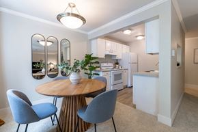 Redmond apartment for rent - A modern dining area with a round table and chairs.