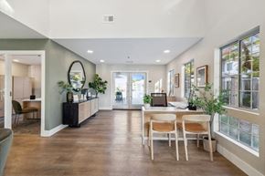 Livermore apartment for rent - A modern dining room with a wooden table and chairs.