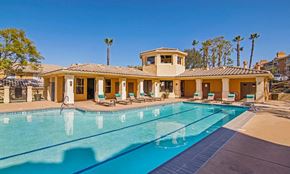 San Diego apartment for rent - a swimming pool with a house in the background