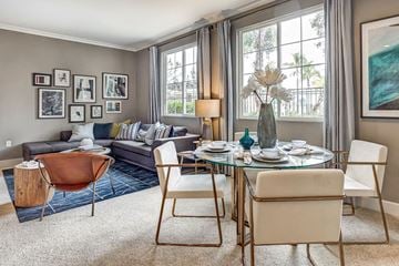 San Diego apartment for rent - a living room and dining room with a table and chairs