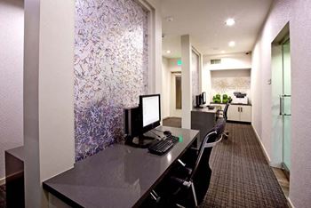 Business center with a printer, fax/copier and high speed internet
