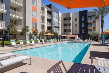 Pool with open-air cabanas and spa area with wi-fi hotspot