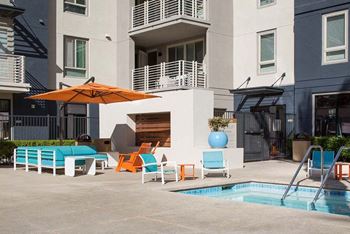 Pool with open-air cabanas and spa area with wi-fi hotspot