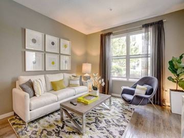 Mountain View apartment for rent - a living room with a couch and a chair and a table