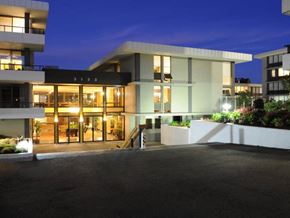 Burlingame apartment for rent - building exterior at twilight