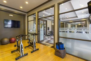 24-Hour fitness center equipped with peloton bikes and stairmaster