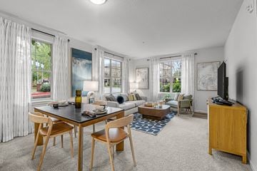 Hillsboro apartment for rent - a living room with a dining room table and a couch