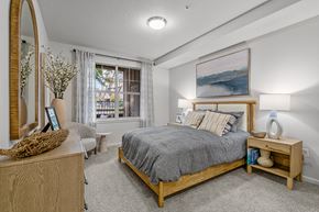 Hillsboro apartment for rent - a bedroom with a bed and a window