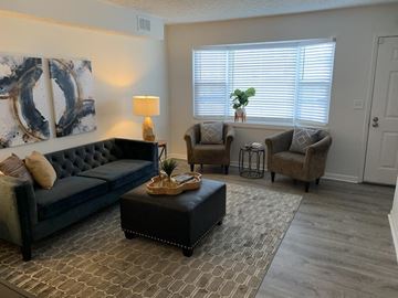 Columbus apartment for rent - a living room with a couch and two chairs