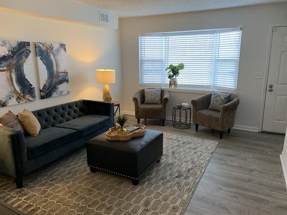 Columbus apartment for rent - a living room with a couch and two chairs