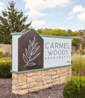 Carmel apartment for rent - the sign apartments at the entrance of the park