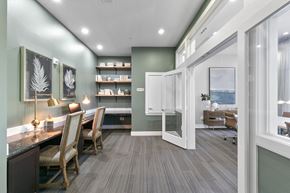 Farmers Branch apartment for rent - a dining room with a table and chairs and a window