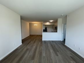 Hebron townhouse for rent - A room with a kitchen area in the background at Hamlet On The Bend, Hebrun