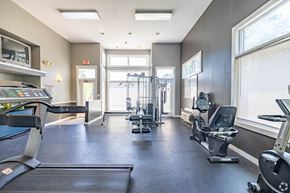 Burlington apartment for rent - A spacious gym with treadmills, elliptical machines, and other exercise equipment.