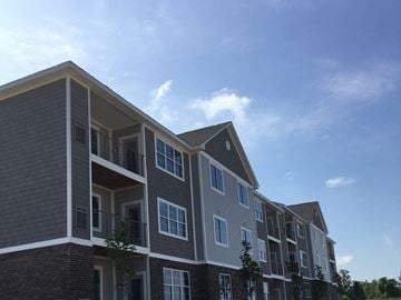 Union apartment for rent - A multi-story residential building with balconies and windows.