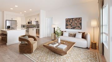 Apollo Beach apartment for rent - A living room with a brown chair and a white couch.
