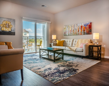 Living room with plank wood flooring
