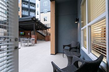 A view of the patio from the door of a building