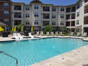 St. Louis apartment for rent - Swimming Pool With Relaxing Sundecks at Vanguard Crossing, St. Louis