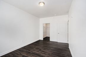 Portage apartment for rent - A room with a white door and a light on the ceiling.