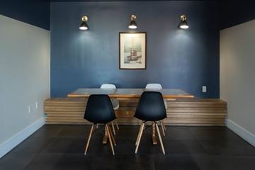 Brooklyn apartment for rent - A dining room with a wooden table and chairs.