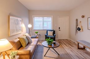 St. Louis apartment for rent - a living room with a couch and a coffee table