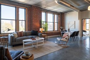 St. Louis apartment for rent - a view of the living room and dining area in a 555 waverly unit