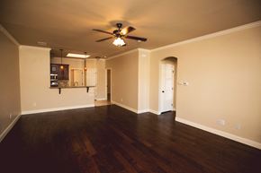 Amarillo apartment for rent - an empty living room with a ceiling fan