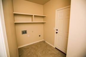 Amarillo apartment for rent - a room with shelves and a door and a closet