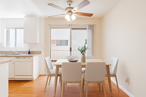 Canoga Park apartment for rent - A dining room with a table set for four.