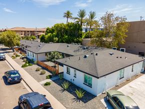 Phoenix apartment for rent - an aerial view of a row of houses with cars parked in front of them