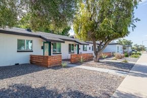 Phoenix apartment for rent - a row of houses with trees in front of them