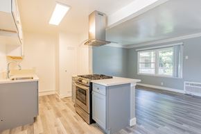 Sherman Oaks apartment for rent - A modern kitchen with a stainless steel range hood.