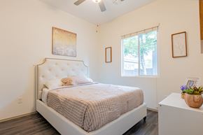 Peoria apartment for rent - a bedroom with a bed and a window at Villas on Olive, Peoria, Arizona