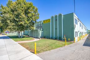 Panorama City apartment for rent - a building with a yellow street sign in front of it