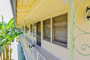 Sherman Oaks apartment for rent - a building with windows and a balcony with a porch