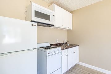 N. Hollywood apartment for rent - a kitchen with a stove microwave and refrigerator